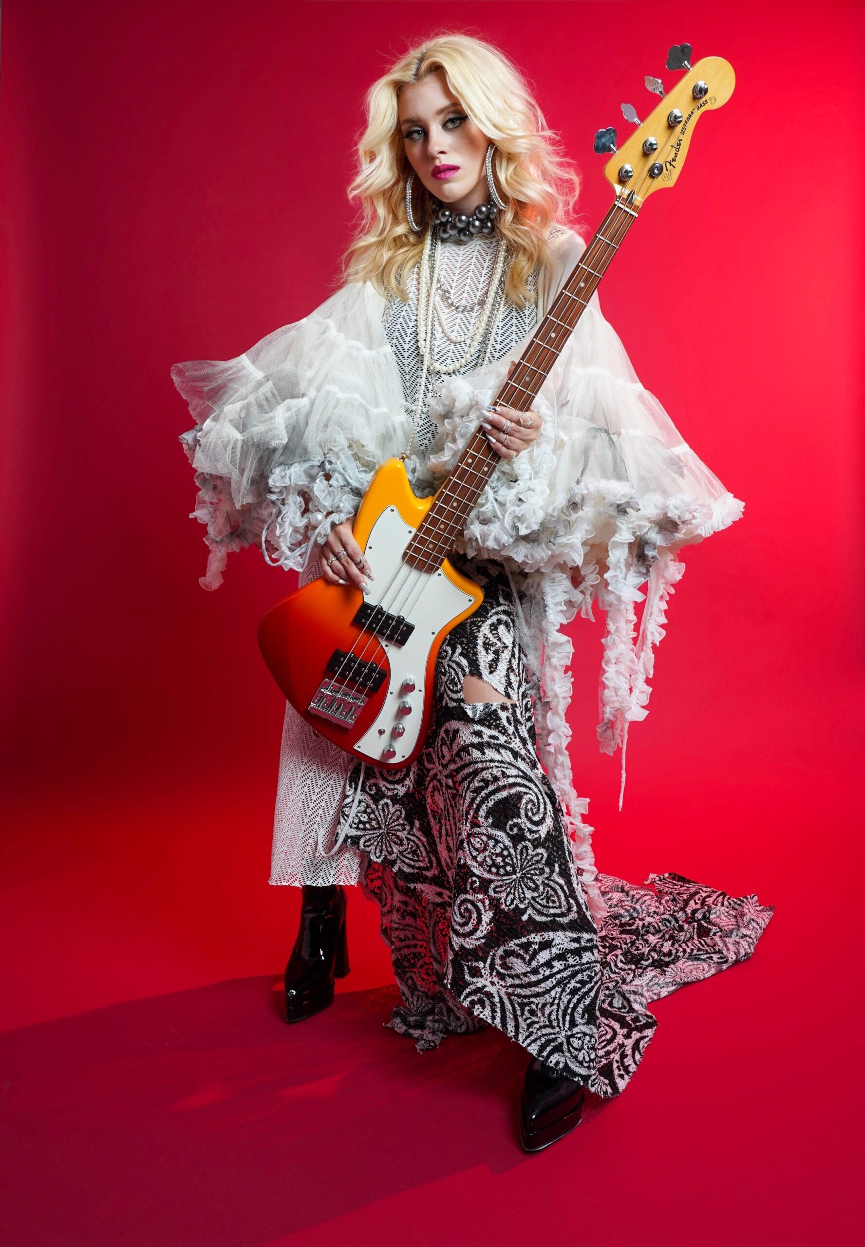 Ashley Suppa, bassist for the all-girl rock band Plush, talks about life on the road, her favorite bass players, and how learning isolated bass tracks translated into a successful career in a rock ‘n’ roll band: “What is happening with my life? How did this end up this way?”