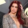 Dua Lipa’s dewy ‘milk jelly’ mani was the ‘it girl nails’ of the Grammys