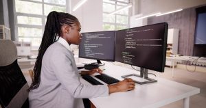 What is the difference between coding and programming?