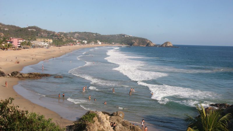 A plane carrying Canadian skydivers hits beach in southern Mexico, killing a man on the ground