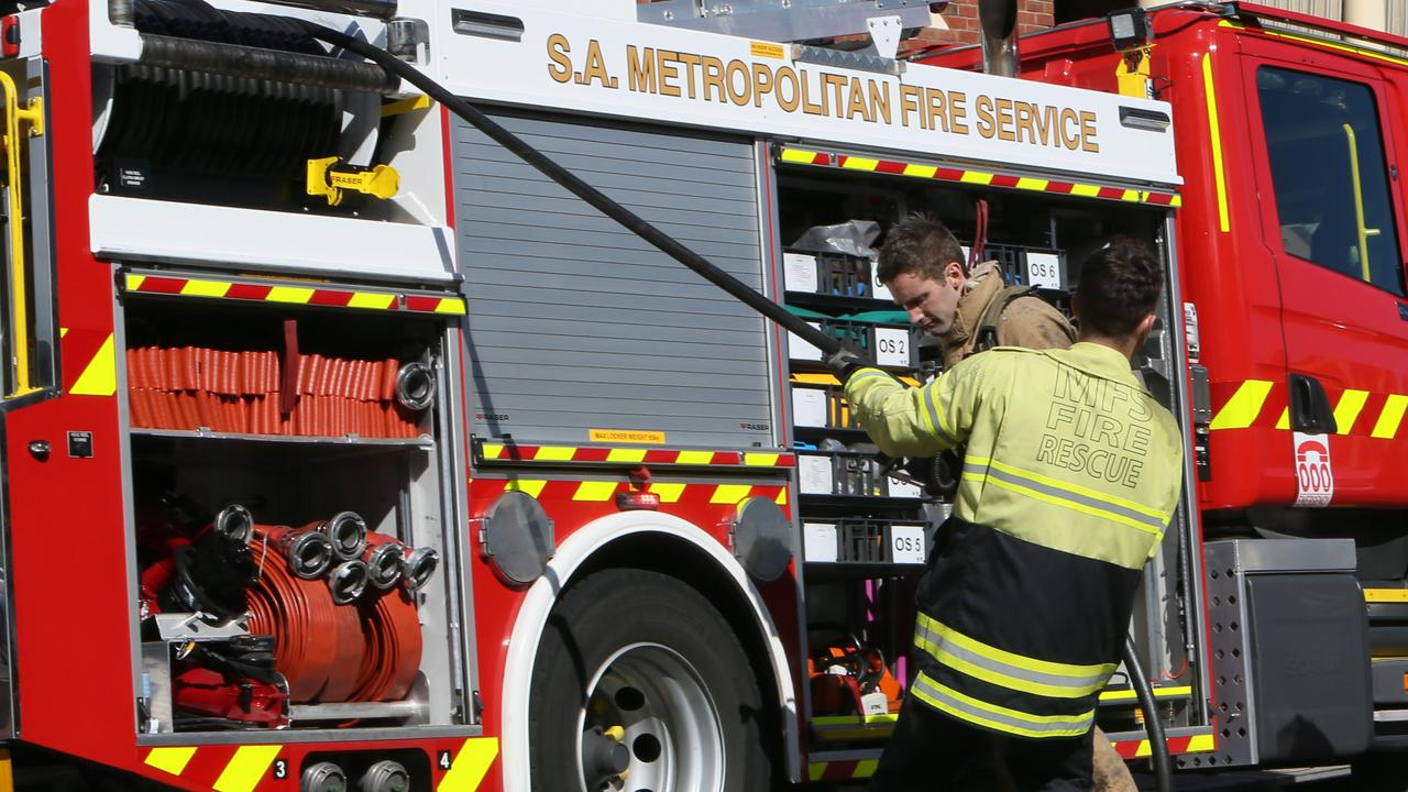 Alert issued as fire burns at recycling centre near major road