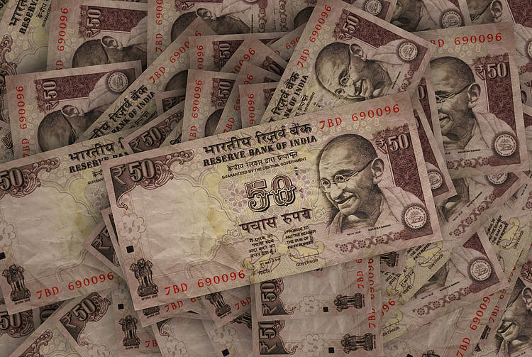 USD/INR posts modest gains, investors await FOMC and RBI Meeting Minutes