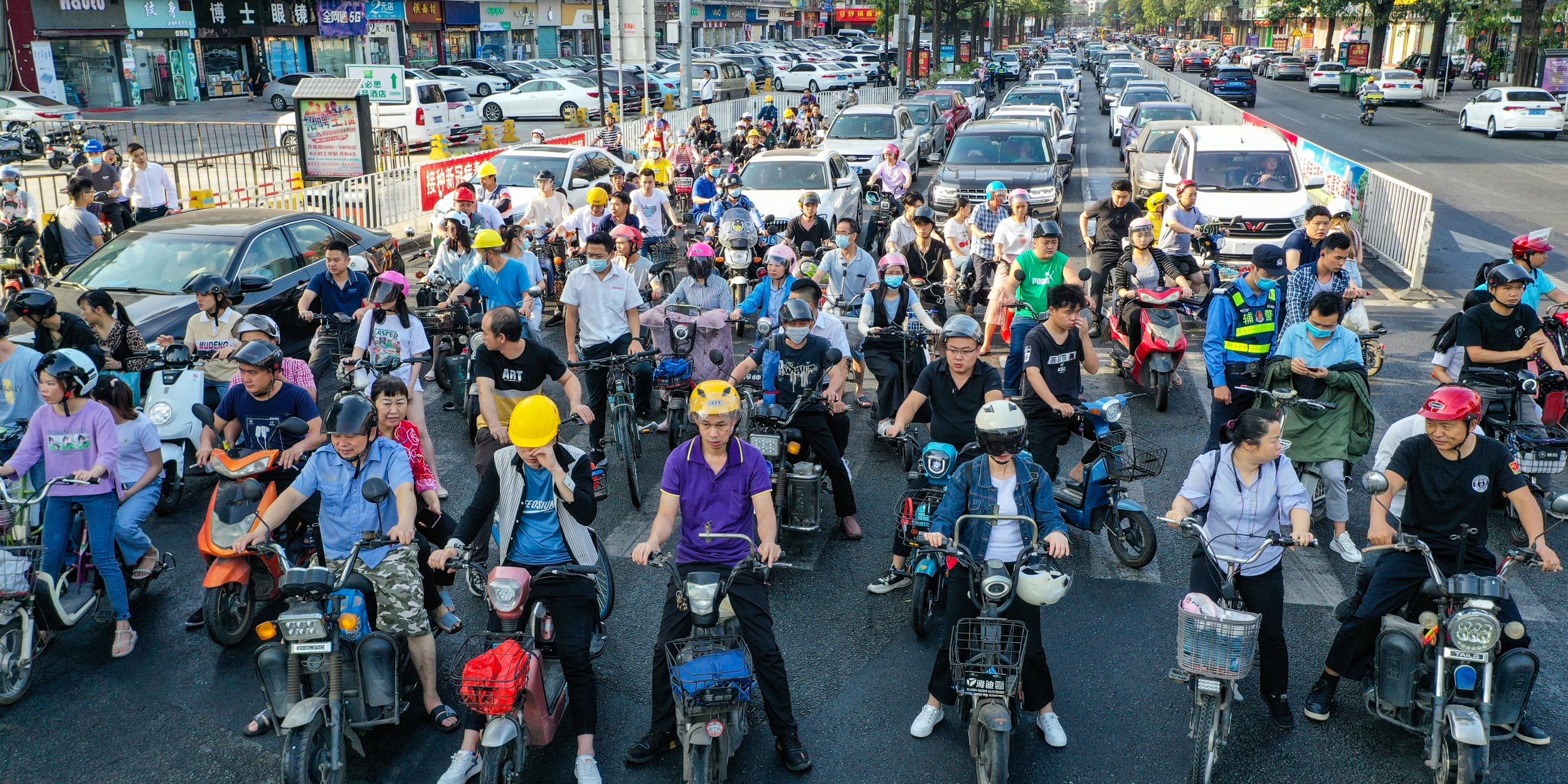 Cars or Scooters? China’s Small Cities at the Crossroads