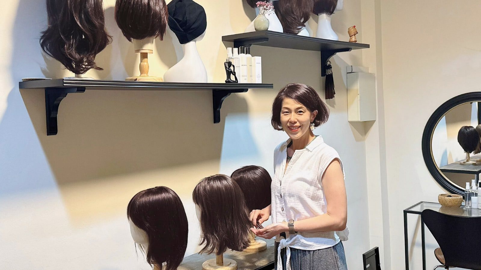 She survived womb cancer and started a wig salon to help others with hair loss