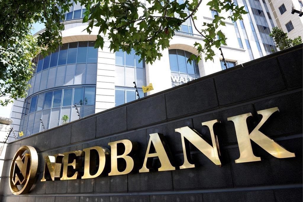 News24 Business | Nedbank ups dividend on solid results even as impairments jump 30%