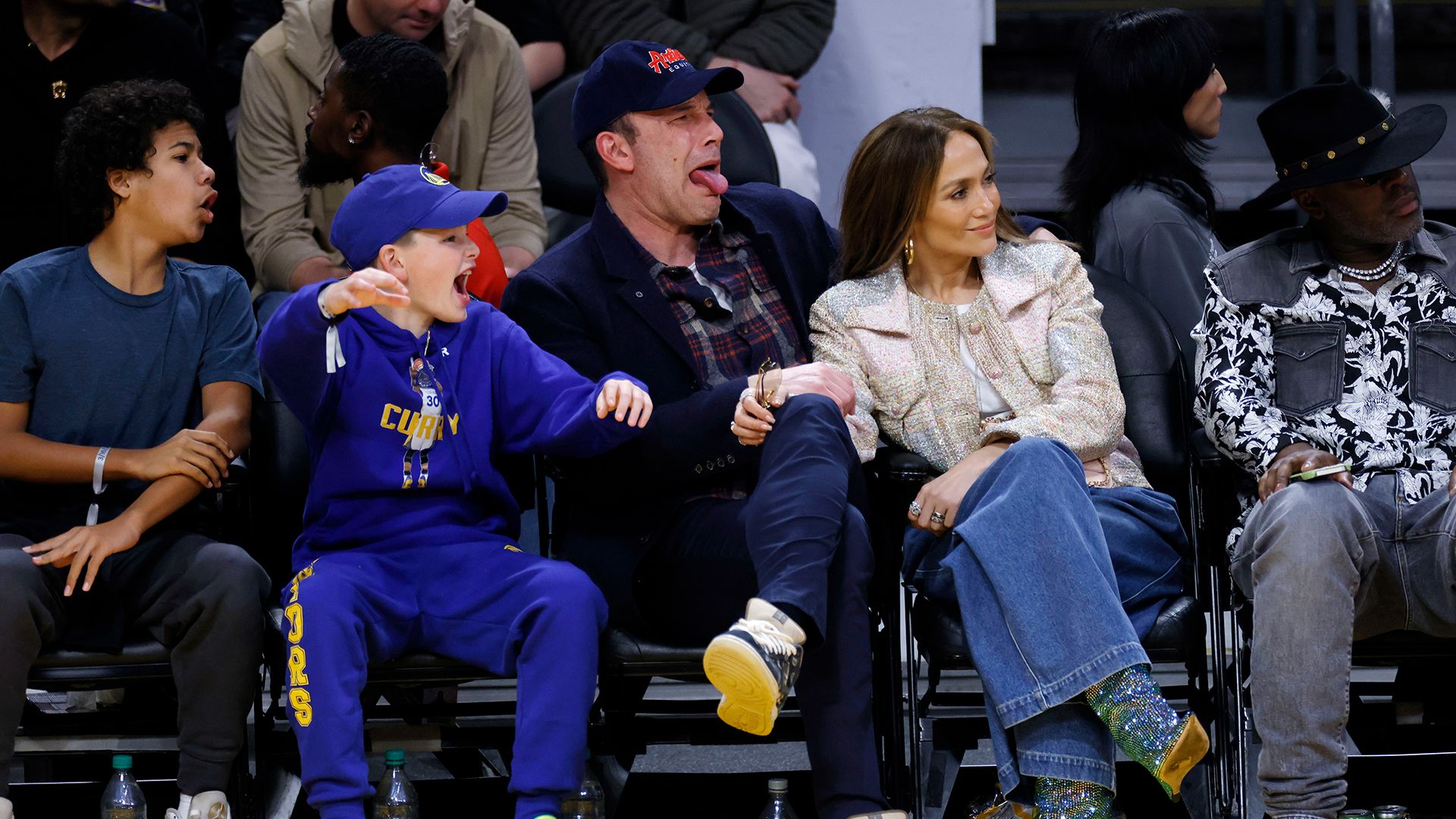 Jennifer Lopez dotes on stepson Samuel, 12, in courtside photos with Ben Affleck