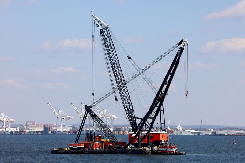 Salvage crews to lift first piece of collapsed Baltimore bridge