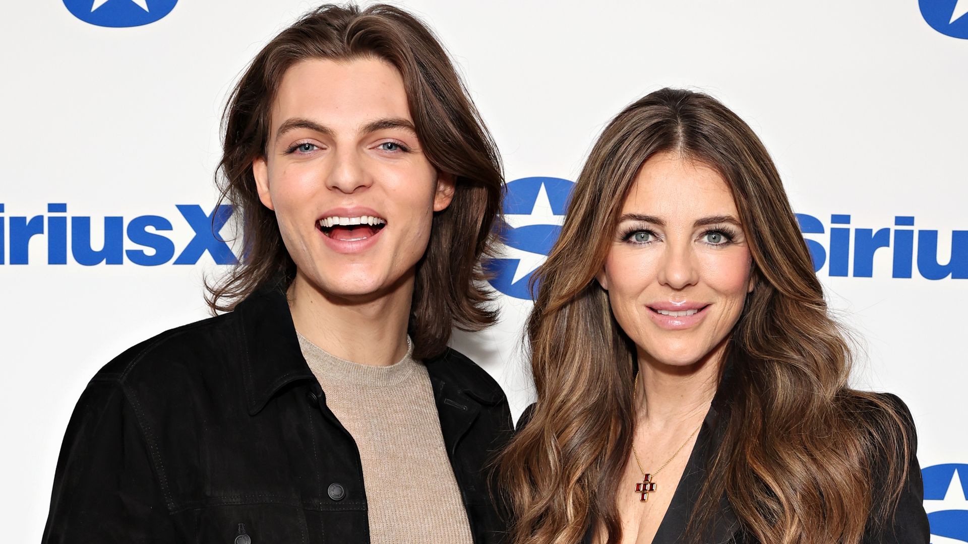 Elizabeth Hurley and her lookalike son Damian turn heads as they twin in black outfits