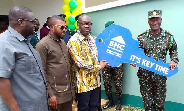 Minister hands over 70 units at J.A.Kufuor Housing Estate to GIS