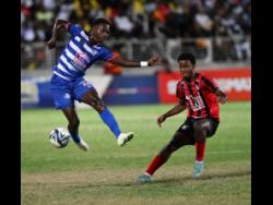 Arnett earn late draw against Portmore