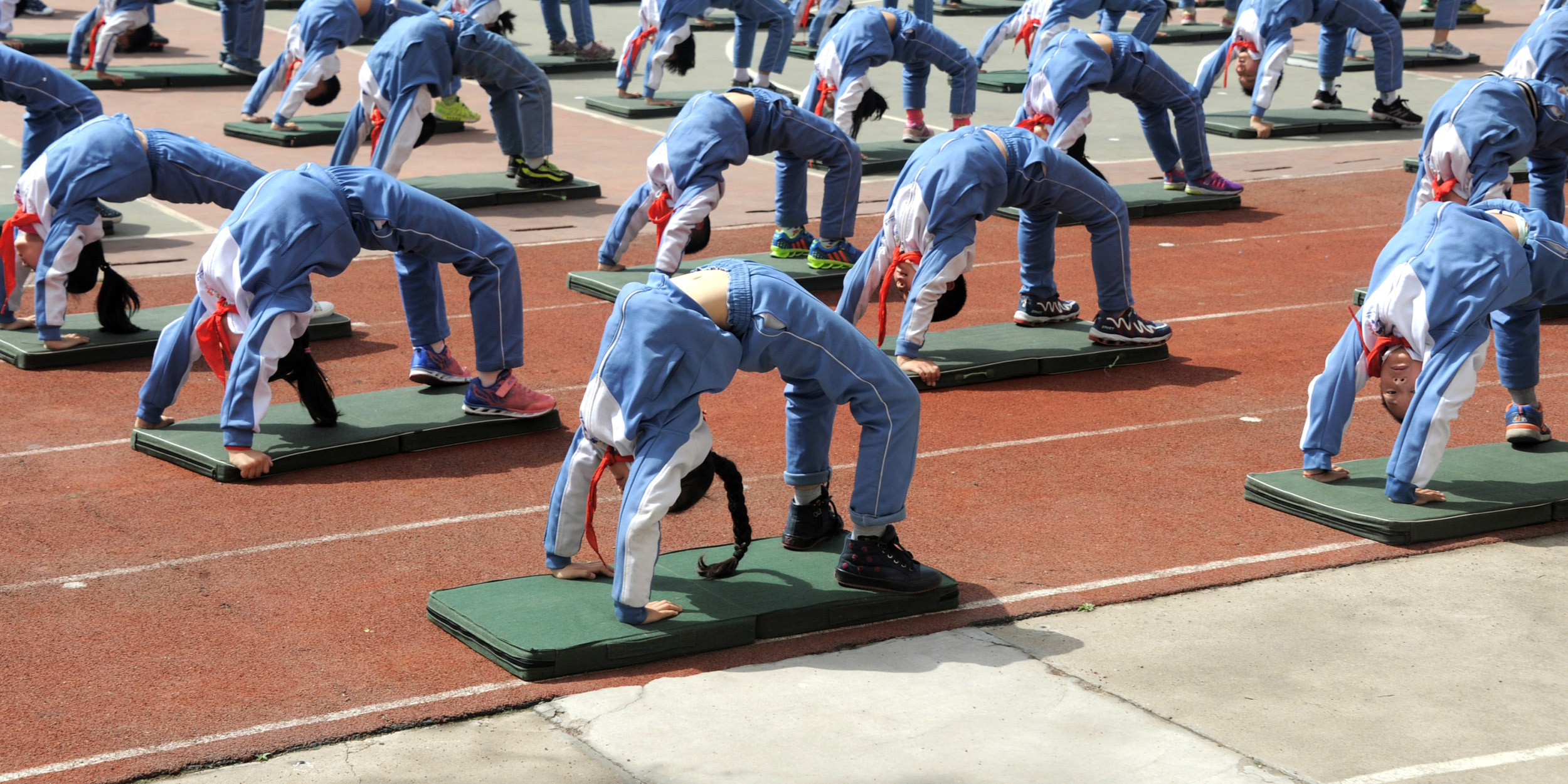 The Backbend: Why a Basic Dance Move Is Paralyzing Children in China