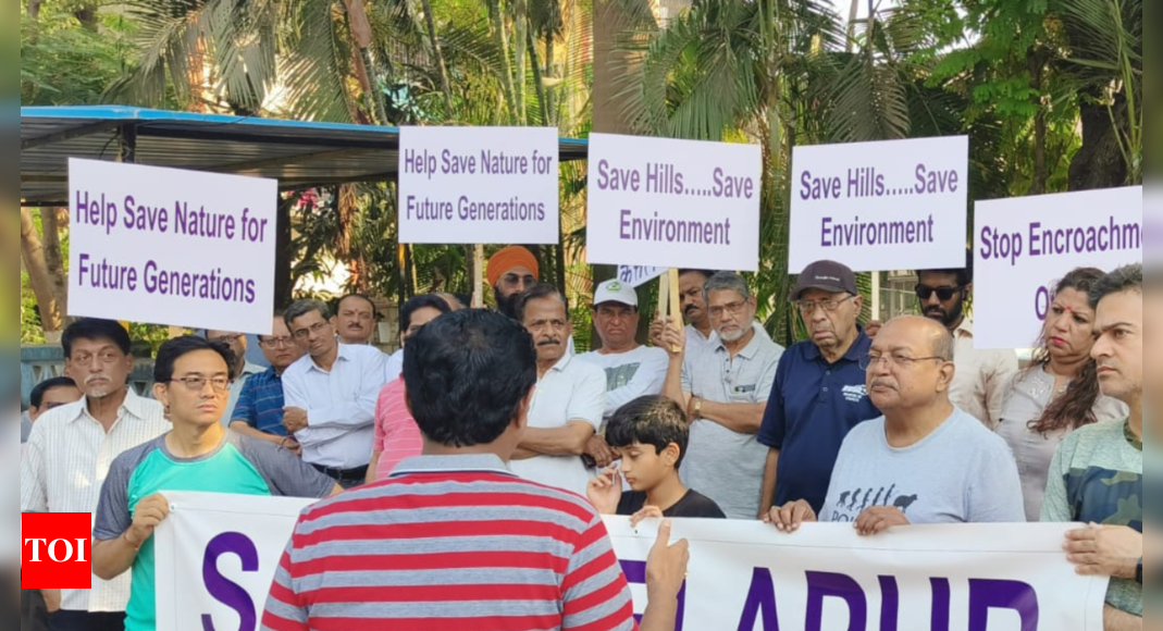 Navi Mumbai: Nature lovers form human chain to save Belapur Hill from encroachments