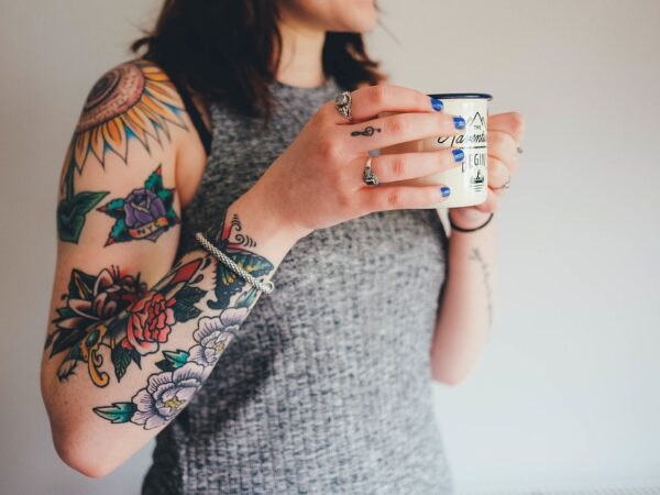 Woman Says She Was Rejected From Job Due To Her Tattoos: Sparks Discussion For Client Facing Roles