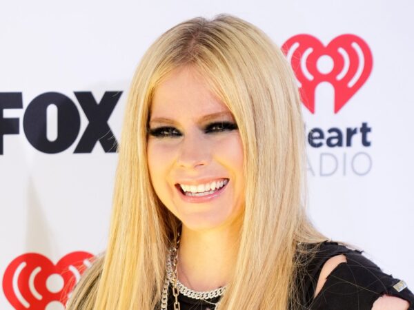 Avril Lavigne fits into her ‘Complicated’ tank top and tie 22 years later in latest photo – and she hasn’t changed one bit