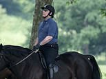 Prince Andrew is seen riding his horse at Windsor